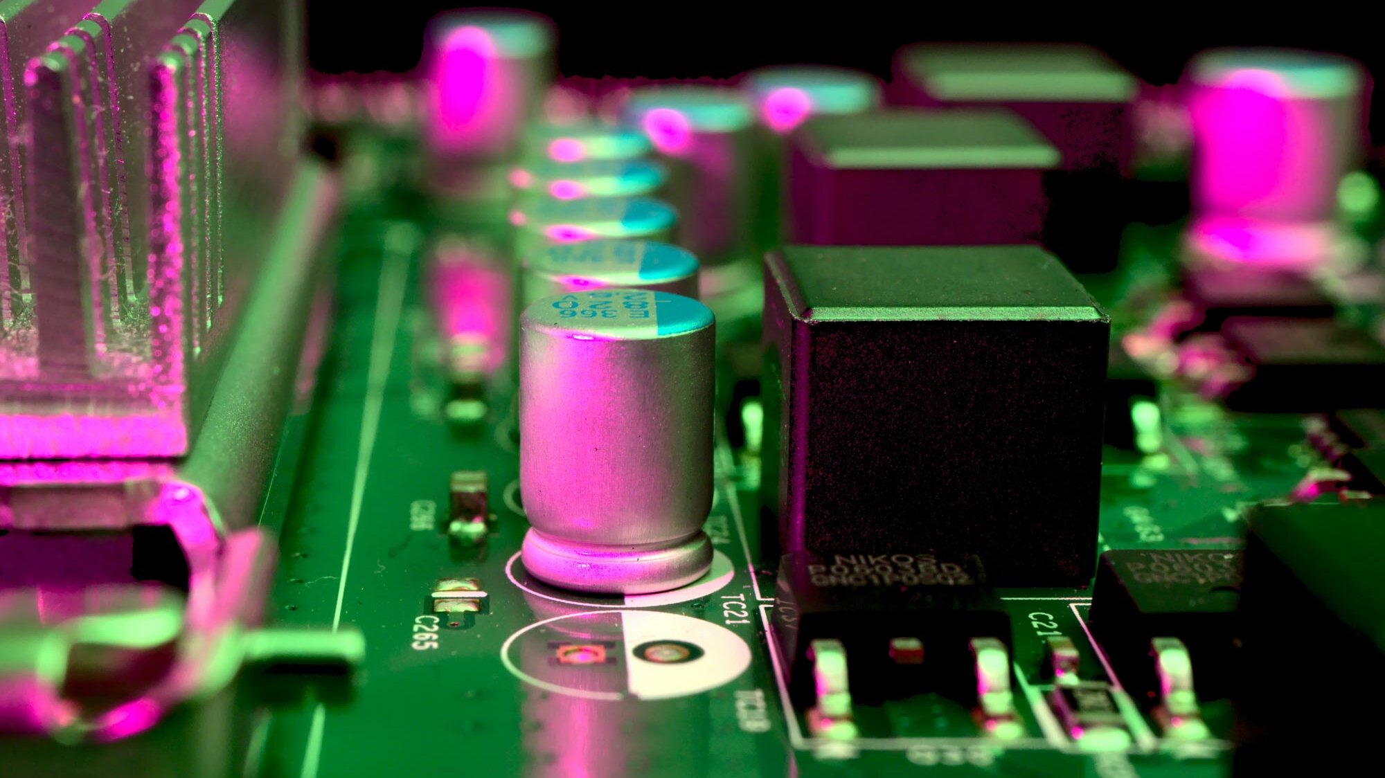 https://unsplash.com/photos/deHhHOttSdk Fine Vacuum; Close up green and purple circuit board