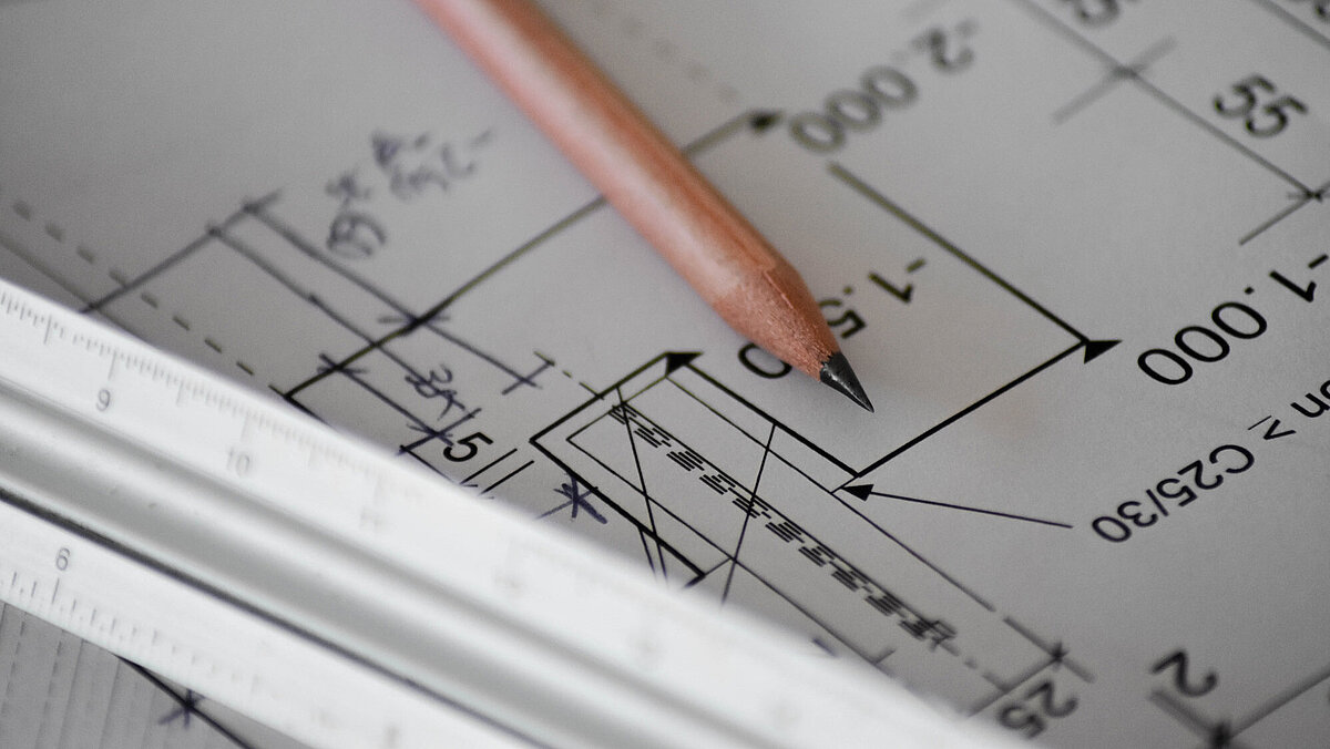 https://unsplash.com/photos/fteR0e2BzKo Quality Guidelines; Brown pencil and ruler laying on a technical drawing
